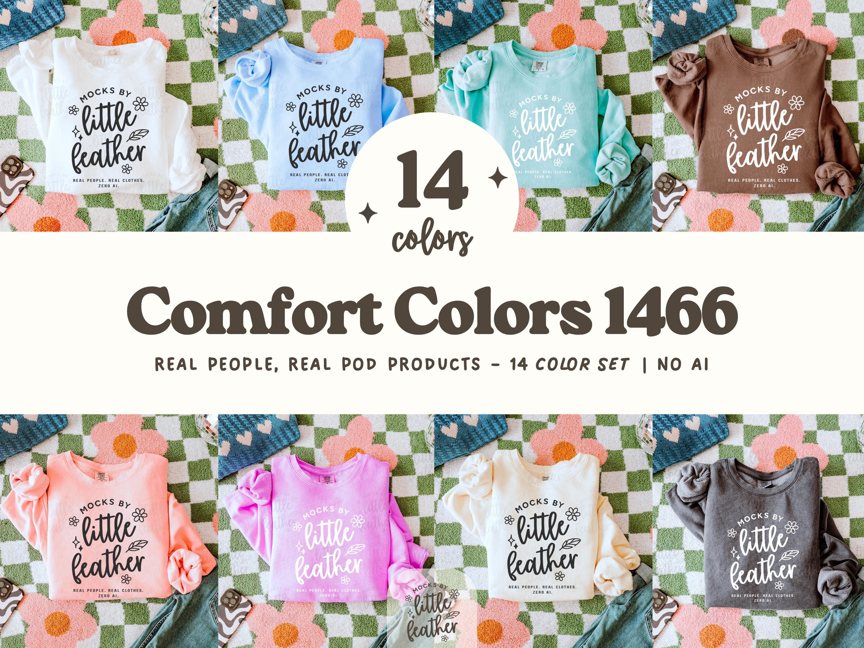 Comfort Colors Mockup featuring the C1466 crewneck sweatshirt in 14 trendy, aesthetic colors. Each sweater is shown folded in a flat lay style on a boho blanket background. This CC 1466 mockup set includes real product photography—no AI—perfect for Etsy, print on demand, and POD sellers. Created by MocksByLittleFeather using real clothes.