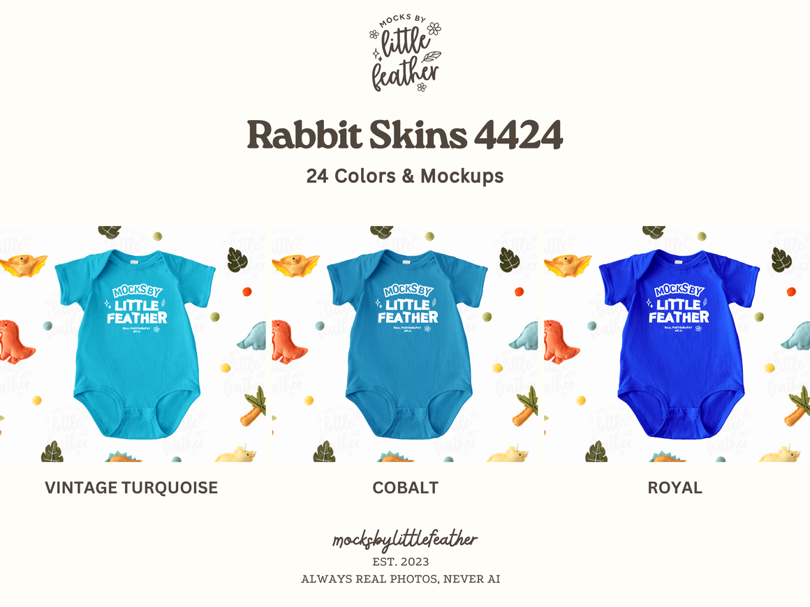a collection of baby onesies in various colors, including turquoise, cobalt, and royal, arranged in a row.