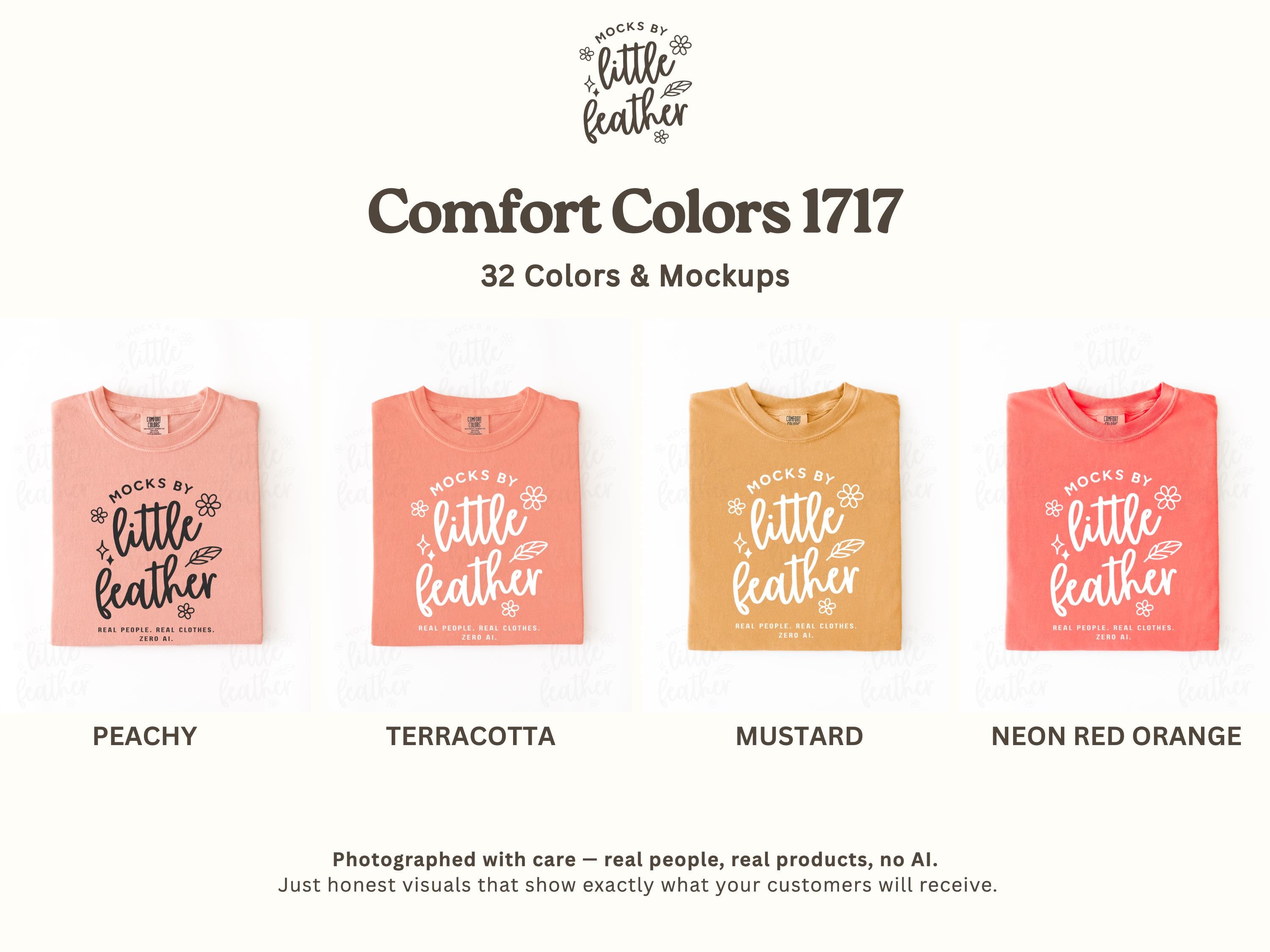 Folded crewneck t-shirts in peachy, terracotta, mustard, and neon red orange, flat lay