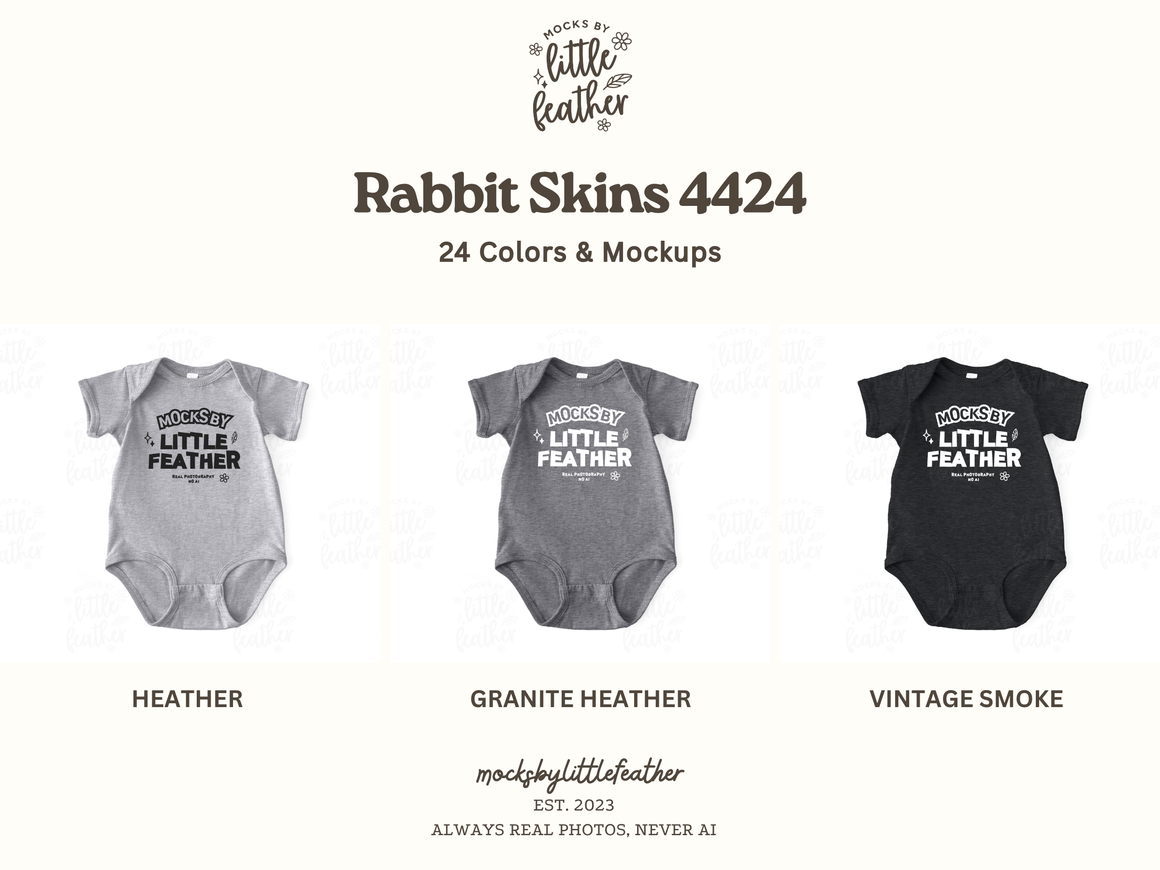 three baby onesies in different colors and styles, including gray, black, and granite heather.